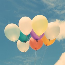 balloons flying on sky